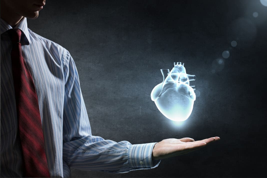 close-up-of-man-hand-holding-human-heart-2026-04-13-23-03-02-utc