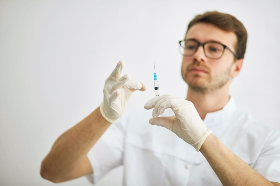 female cosmetologist is preparing for an injection Treating Erectile Dysfunction Through Regenerative Methods
